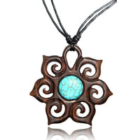 Load image into Gallery viewer, The Surferkette features a hand-painted wooden flower-surfboard pendant with a turquoise stone on an adjustable cotton cord—ideal for surfer style Halsketten fans.
