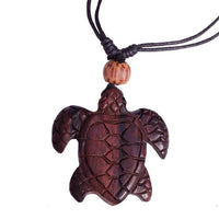 Load image into Gallery viewer, This handgemachte Halskette, "Halskette verstellbar Baumwolle Kette Holz Perlen Blatt Schildkröte Om Spirale," features a carved Holz Schildkröte-Anhänger an einer schwarzen, verstellbaren Baumwollkette mit Holzperlen. Unisex Schmuck.
