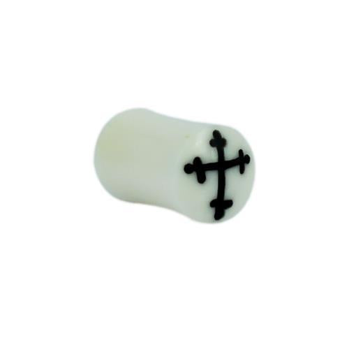 A small white cylindrical Tribal Bone Plug with a black gotisches Kreuz design—hand-carved, ideal as an Organic Expander Plug for Piercing or Tribal Schmuck creations.