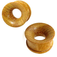Load image into Gallery viewer, Two circular, light brown Tunnel ocker Jackfrucht Holz handgeschnitzt ribbed plugs, designed for stretched earlobes, are displayed on a white background. Each plug has a hollow center and a smooth, polished finish.
