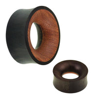 Load image into Gallery viewer, Two handmade Holz Tunnel in schwarz-braun Eisenholz/Teakholz, each with a flared rim and polished finish. One is angled, the other shown from above to display the circular hollow center—perfect as stylish ear jewelry.
