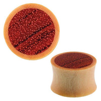Load image into Gallery viewer, A pair of Holz Plug Flesh Tunnel Teakholz hell dunkel Inlay double flared, featuring a circular face resembling a watermelon with a red center, black seeds, and light brown rind—adds playful charm to any collection.
