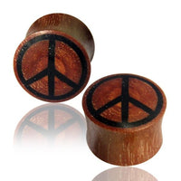 Load image into Gallery viewer, Two Tribal Plug Peace Symbol schwarz rotbraun Rosenholz plugs, each cylindrical and made of rosewood with a black peace symbol on the face, are displayed on a white background with a subtle reflection.
