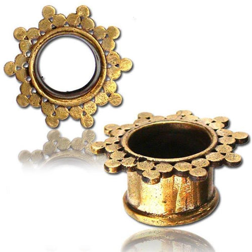 Two Brass Tunnel antique Finish Dreiecke gold, nickelfrei plugs with flared edges and an overlapping circle floral design are shown on a white background with a subtle reflection beneath each organic Messing Expander Ohrschmuck.