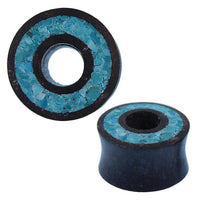 Load image into Gallery viewer, Two black cylindrical Holz plugs with a central hole, featuring a rim of crushed turquoise inlay. The "Flesh Tunnel Eisenholz schwarz Rim Crushed Türkis Inlay" blends tribal elegance and bold design for fans of Flesh Tunnel Türkis styles.
