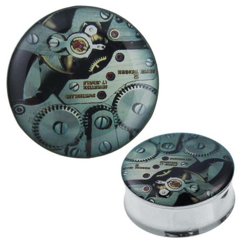 A round Plug Tunnel Uhrwerk in green stainless steel and acrylic with a top lid featuring Metalluhrwerk Zahnräder and gears, shown from above and at an angle.