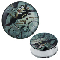 Load image into Gallery viewer, A round Plug Tunnel Uhrwerk in green stainless steel and acrylic with a top lid featuring Metalluhrwerk Zahnräder and gears, shown from above and at an angle.
