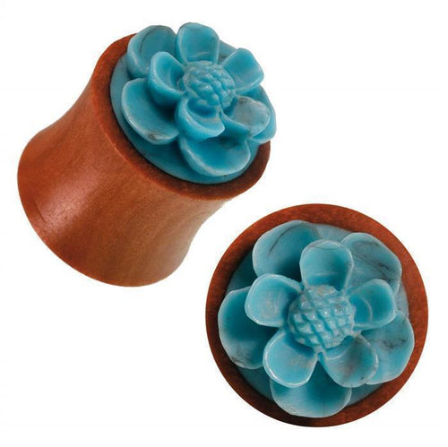 The Rosenholz Plug rotbraun features a 3D flower design with Türkis inlay, shown from the side and above on a white background. This Tribal Expander Tunnel is crafted from organic wood.