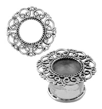 Load image into Gallery viewer, Two ornate round frames, one upright and one flat, featuring swirl designs inspired by the Silbertunnel Seil Spiralbögen Kreise Punkte 925 Sterling Silber Tunnel Plug Expander Ohrschmuck. Central openings are present in both.
