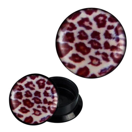 A pair of round black Schraub Plug Acryl Leo Muster weiß braun Expander Piercing Ohrschmuck, featuring a bold white and brown leo pattern on the flat front—one plug shown face up, the other with the screw-back opening visible.
