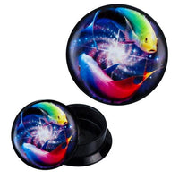 Load image into Gallery viewer, The Schraub Plug Acryl Weltall Strudel features a round black container with a lid showing vibrant, colorful koi carp swimming in a cosmic, starry background—an eye-catching piercing ear jewelry piece.
