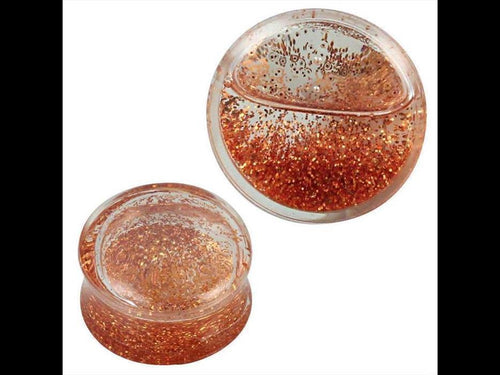 These Plug Acryl transparent Flüssigkeit Glitzer orange Piercing Ohrschmuck feature two round, clear acrylic plugs with shimmering orange glitter suspended in liquid, perfect as decorative jewelry for stretched piercings.