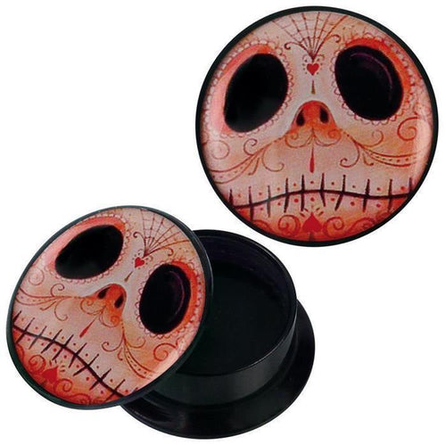 A round black acrylic screw plug with lid, featuring an orange Candy Skull Geist Naht design inspired by Day of the Dead, with large dark eye sockets and ornate patterns. Perfect as piercing ear jewelry (Ohrschmuck).