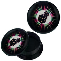 Load image into Gallery viewer, A pair of Schraub Plug Acryl Würfel Strahlen pink grün Piercing Ohrschmuck shown on a white background, featuring black circular plugs with a starburst design, geometric shapes in the center, and small yellow dots.
