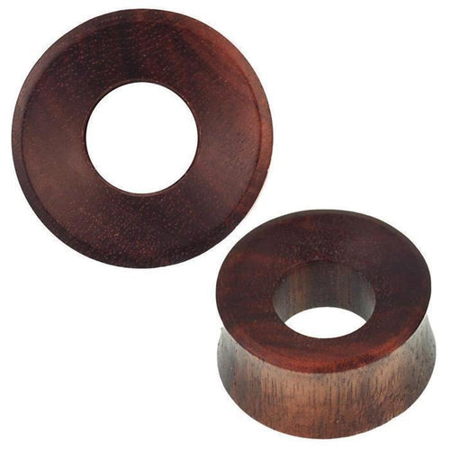 Two concave "Holz Tunnel breit" plugs, dunkelbraun with brown grain, shown from top and side. The polished finish and flared edges make these Tribal Piercing Holz Tunnel earrings stylish and comfortable.