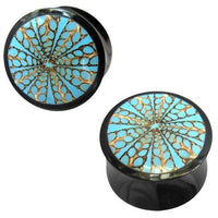 Load image into Gallery viewer, A pair of black hand-carved Büffelhorn tribal plugs, "Horn Plug Spinnennetz blau," featuring turquoise and beige mandala-style geometric designs, displayed on a white background.
