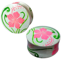 Load image into Gallery viewer, Two small round white boxes with lids, decorated with hand-painted pink flowers and green vines, resemble charming Holz Plug Hawaii Blume rosa grün Tunnel Ohrschmuck aus Teakholz, displayed side by side.
