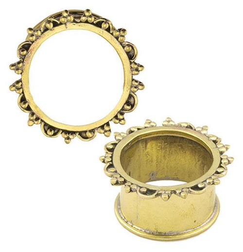 Two ornate, antique gold Brass Tunnel Bogen Punkte Dreieck nickelfrei Plugs made from Messing display decorative beaded edges. One stands upright while the other lies flat, highlighting their elegant design.