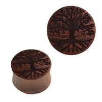 Load image into Gallery viewer, A pair of Plug Teakholz Baum des Lebens double flared braun with an intricate tree of life design—stylish Holzschmuck ideal for nature enthusiasts.
