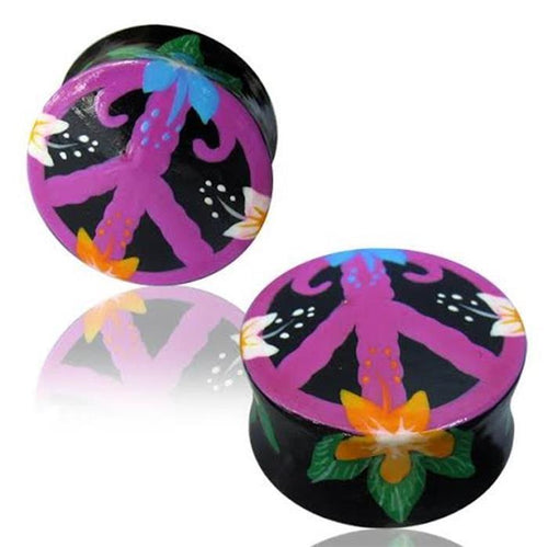 Two black Holz Plug Peace Hawaii Blumen Ohrringe with vibrant floral designs and a striking purple peace symbol—an eye-catching organic Teakholz Ohrschmuck.