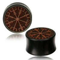 Load image into Gallery viewer, Two round, dark Plug Arangholz Wikinger Kompass Inlay double flared plugs, featuring the Norse runic compass on the front, are displayed from different angles on a white background.
