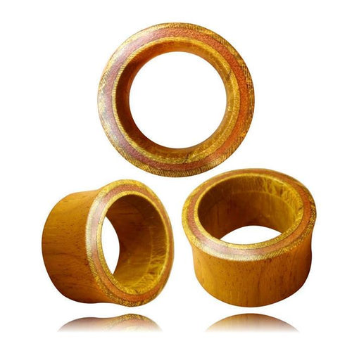 Three double-flared Flesh Tunnel Teakholz Sawoholz Rim rot rings, featuring a smooth finish and wood grain reminiscent of plug designs, are displayed from various angles against a white background.