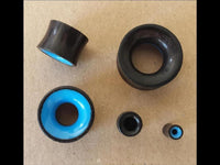 Load image into Gallery viewer, Flesh Plug Eisenholz Holz dunkel double flared blau Resin Inlay Ohr Piercing
