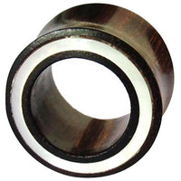 Load image into Gallery viewer, Close-up view of the Holz Flesh Tunnel Perlmutt Inlay weiß Plug in dark brown, highlighting its white inlay, hollow center, and reflective surface reminiscent of high-quality jewelry craftsmanship.
