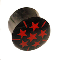 Load image into Gallery viewer, The Horn Plug schwarz rot Sterne Büffelhorn double flared features a black buffalo horn body with six red stars and short red lines in a circular pattern on top, shown against a white background.
