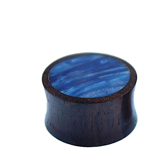 A round, dark Holz Plug Sonoholz with a slightly flared shape and a polished top featuring a shimmering blue Resin Inlay. The background is plain white.