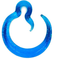 Load image into Gallery viewer, A translucent blue acrylic Feuerglas Spiral Taper Dehner Ohrgewicht, shaped like a curved crescent with a small hooked end—ideal as a distinctive plug earring.

