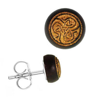 Load image into Gallery viewer, The Holzohrstecker Edelstahl Sonoholz rund 8mm gold Motive is a round stud earring featuring a gold Celtic knot design on a dark wood base, finished with a standard silver push-back post.
