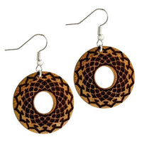 Load image into Gallery viewer, A pair of round "Ohrringe Jackfrucht Holz rund Edelstahl Silber Gravur" featuring a central cut-out and dark engraved geometric patterns, hanging from simple silver stainless steel hooks.
