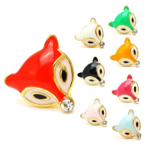 Eight vibrant, fox head-shaped Brass Ohrstecker Fuchs Kristall (12 mm), made of colorful faceted gold enamel, nickel-free brass. Available in red, white, green, orange, black, yellow, pink, and light blue. The red fox design stands out most.