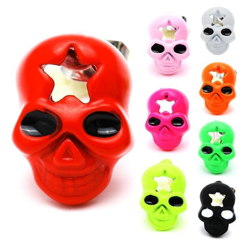 The Brass Ohrstecker Stern Sterne bunt Unisex Ohrringe (12 mm, Edelstahl, nickelfrei) are shown in red, pink, white, orange, green, black, and light blue, arranged on a white background.