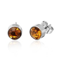 Load image into Gallery viewer, A pair of silver Brass Ohrstecker featuring 6mm round, faceted, colorful Glaskristall gemstones, crafted to be nickelfrei and displayed against a white background.
