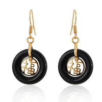 Load image into Gallery viewer, A pair of brass Ohrringe Ohrhänger Damen earrings featuring round cat's eye hoops and intricate designs, inspired by the "Brasshänger Katzenauge rund" style.
