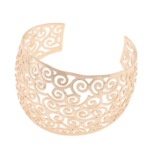breiter werdender Brass Armreif golden 45 mm Spiralen Stanzmuster - chic - net.de