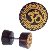 Load image into Gallery viewer, Fake Holz Plug Tamarinde dunkelbraun Maserungen OM - Zeichen Blume Rand golden Piercing - chic - net.de
