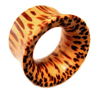 Load image into Gallery viewer, The Holz Flesh Tunnel Palmholz braun Punkte double flared features a wooden design with light brown color and dark, irregular dot patterns—ideal for an organic piercing look.
