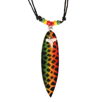 Load image into Gallery viewer, Discover the Surferkette Haifzahn—a round, adjustable necklace featuring a wooden surfboard, shell accents, and a shark tooth charm. Perfect for fans of surfer style and unique accessories!.
