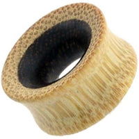 Cargar imagen en el visor de la galería, A close-up of the Tunnel Eisenholz Bambusholz schwarz hellbraun Punkte Maserung Holztunnel, a hand-carved tribal wood plug featuring light and dark grain patterns—ideal as a stylish unisex accessory.
