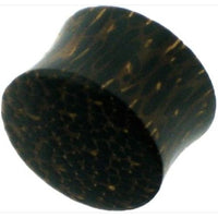 Load image into Gallery viewer, The Holzplug Palmenholz dunkelbraun schwarz mit Punktmuster ist ein handgeschnitzter Tribal Plug Tunnel Expander mit zylindrischer Form und ausgeprägter Maserung, ideal als Ear Gauge oder Body Jewelry.
