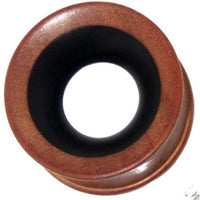 Load image into Gallery viewer, This hand-carved Tribal Plug Expander is a round, brown and black, two-tone Holztunnel made from teak and ironwood, featuring a wide black-rimmed opening at the center.
