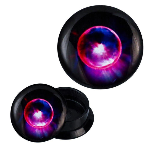 A pair of black Schraub Plug Acryl Komet plugs for all piercings, each featuring a glowing cosmic sphere in red, purple, blue, and white hues—one plug stands upright, the other is shown at an angle.