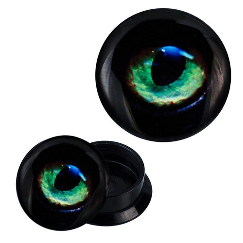 A pair of black Schraub Plug Acryl ear plugs featuring a realistic green and blue puma eye design, with one plug’s cap removed to display its hollow interior.