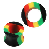 Load image into Gallery viewer, Two Tunnel Acryl Streifen Rasta Farben rot gelb grün schwarz Piercing Ohrschmuck are shown: one stands upright displaying the side, and the other lays flat to reveal the opening, both featuring a striped Rasta color pattern.
