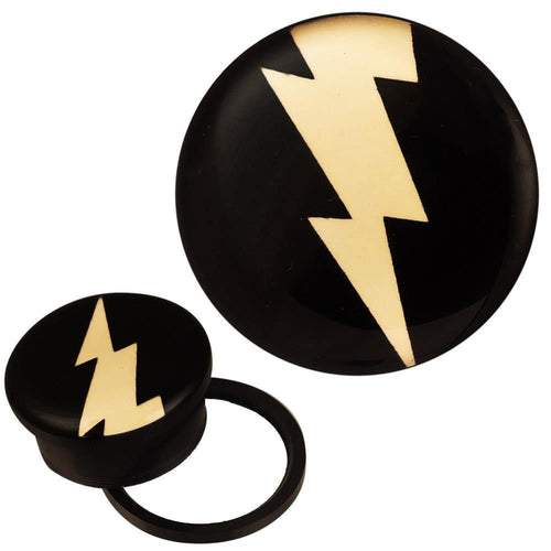 The Schraub Plug Tunnel Acryl schwarz weiß Blitz mehrzackig shows a black plug with a striking yellow lightning bolt; one plug is front-facing, and the other is angled to display the side and back design.