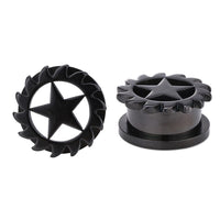 Cargar imagen en el visor de la galería, Two dark gray, lightly shiny Schraubplug Chirurgenstahl Tunnel Plugs made of thin stainless steel feature a central star and a jagged edge. One stands upright to show the front; the other lies flat to display the top view.
