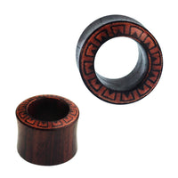 Load image into Gallery viewer, Two handcrafted Tunnel Sonoholz rot ear plugs with double flared ends and square flower designs featuring crushed stone inlay. One is upright, the other angled to showcase the intricate handmade detail.
